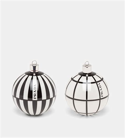 Christmas baubles for fashion fans, from Dior to Prada .